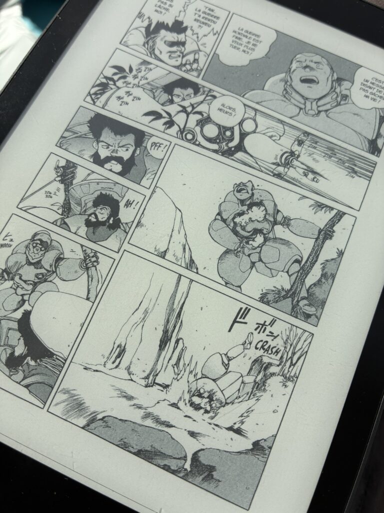 Une page du tome 1 de Ghost in the Shell sur ma liseuse noir & blanc Kobo Aura One de 7,8".